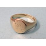 A 9ct gold signet ring, size W, 9.8g.