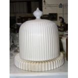 A late 19th century Stilton cheese dish and dome with ribbed decoration, 30cm high, (dish crazed,