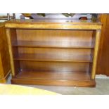 A mahogany dwarf open bookcase, 122cm wide, 93cm high, 26cm deep.