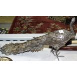 An oriental plated peacock, 21cm high, 38cm long a plated half-gadrooned teapot, candlesticks and
