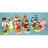 A collection of fifteen Royal Doulton Bunnykins figures: 'Witches Cauldron' DB293, 'Rugby Player'