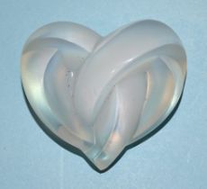 Lalique, Paris, a "Coeurs Entrelaces Paperweight" of two intertwined hearts, 1998, approximately 6cm