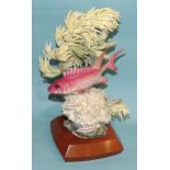 A Royal Worcester model group of a "Squirrel Fish" by Ronald van Ruyckevelt, no.118/500, on fitted