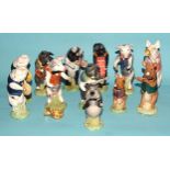 A collection of eleven Royal Doulton/Beswick figures from The Pig Prom: 'John' PP1, 'Matthew'