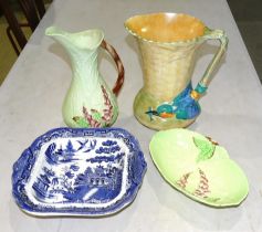 A Burleigh Ware jug decorated with a kingfisher, 25cm high, a Carltonware green leaf-glazed jug