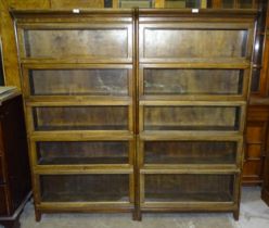 A pair of oak Globe Wernicke bookcases, each with five glazed compartments, 171cm high, 87cm