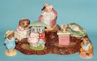 A collection of seven Beswick Beatrix Potter figures: 'Little Pig Robinson - Spying', 'Goody & Timmy