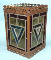 An early-20th century hanging lantern of square form, with four multi-coloured leaded glazed panels,