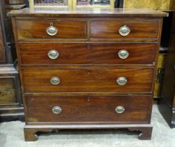 A late George III mahogany rectangular chest of two short and three long cock-beaded drawers on