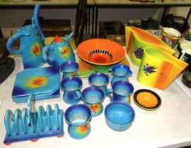 A group of modern designed ceramic tableware, one piece signed and marked Carouge, Switzerland,