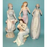 A collection of four Royal Doulton figurines: 'Tender Moment' HN4192, 'Debut' HN3046, 'Rose