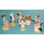 A collection of six Beswick Beatrix Potter figures: 'Hunca Munca Sweeping', 'Mrs Tiggy Winkle', '