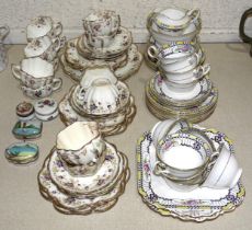 A collection of Melba China teaware decorated with pansies, thirty-five pieces, (no visible