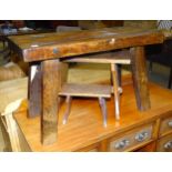 Two small oak trestle stools and a larger trestle stool, 28cm, 47cm and 77cm wide, (3).