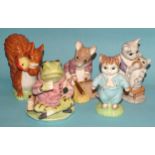 A collection of ten Royal Doulton/Beswick large gold-edition figures: 'Hunca Munca Sweeping', '
