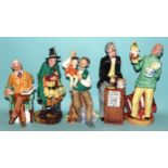 Five Royal Doulton figurines: 'Punch and Judy Man' HN2765, 'The Auctioneer' HN2988, 'The