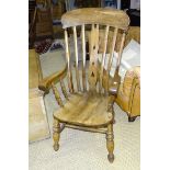 An elm and beech lathe-back kitchen chair on turned legs and a spindle-back farmhouse chair, (cut
