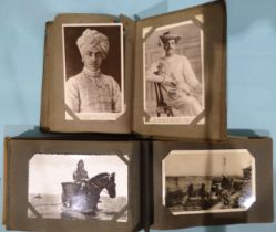 Two small albums containing approximately 120 postcards: early 20th century army and navy