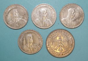 Germany, a 1927 five-Reichsmark coin, together with four Switzerland five-francs coins: 1932 (x3)