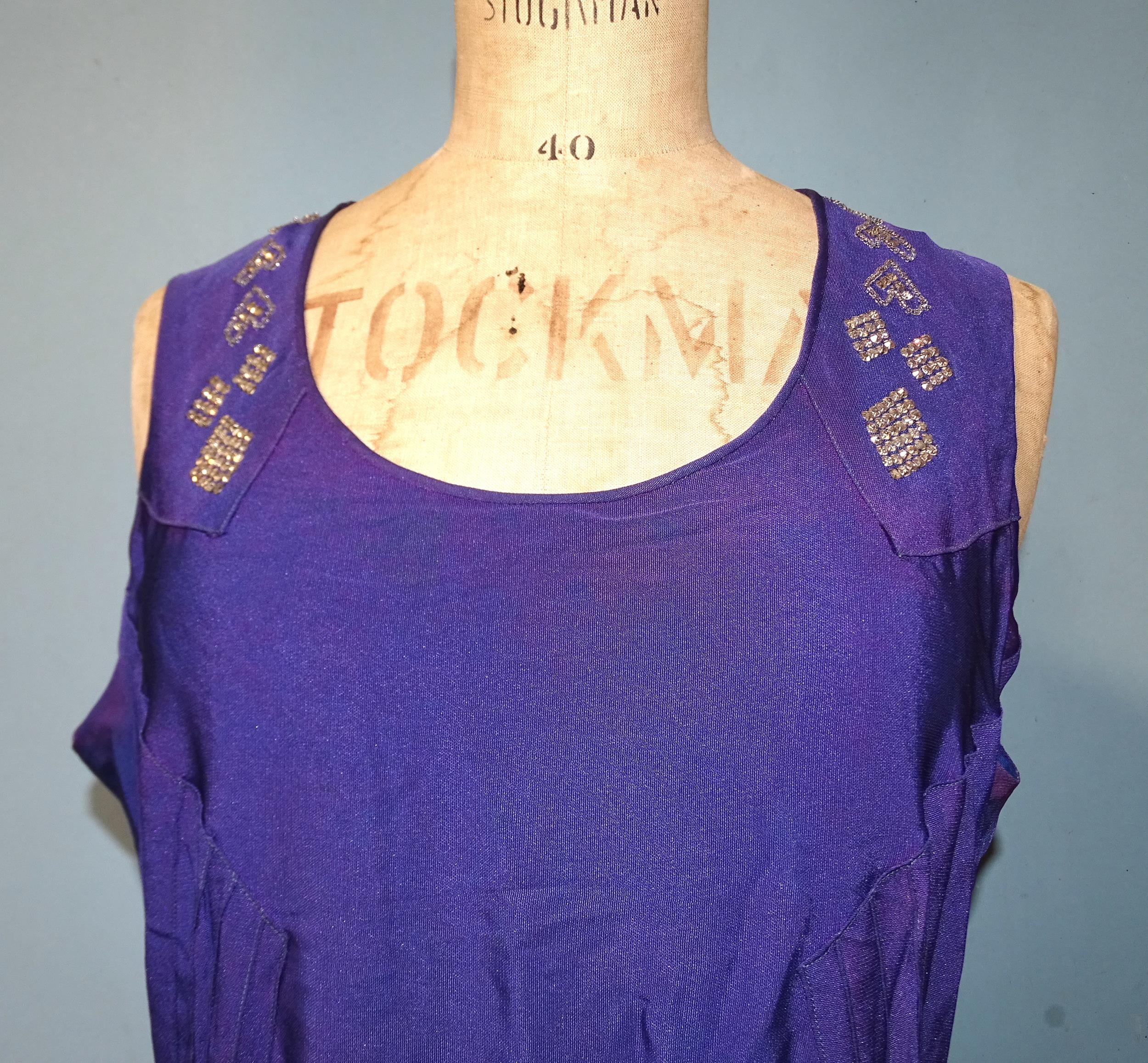 A 1930's evening dress of purple satin-like material, sleeveless, with hand-beading to neckline, the - Image 4 of 5