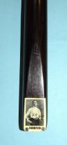 The Melbourne Inman Cue, 57½'' long, 15½oz weight, with ivorine 'young photograph' badge, (no case).