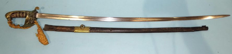 A naval sword with brass lion's head pommel, the 81cm single-fullered blade indistinctly signed,