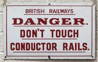 An enamel sign "British Railways, Danger Don't Touch Conductor Rails", red lettering on white