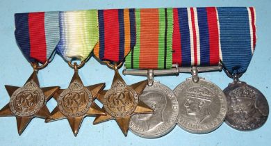 A WWII group of six medals awarded to 1939-45 Atlantic and Burma Stars, Defence Medal, War Medal and