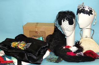 A Gieves hat box containing various cocktail hats, a vintage tiara, feathers, silk flowers, etc, two