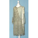 A 1930's pale blue chiffon and embroidered net cocktail dress, a modern beaded dress and other