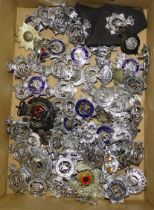 A collection of approximately one hundred various police constabulary badges, etc.