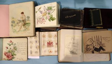 A small album of crests and monograms and a collection of mainly juvenile commonplace albums and