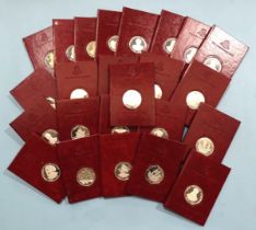 Birmingham Mint, a collection of twenty-four silver medallions "Discovery in Silver" series, each