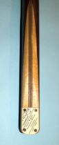 A collection of three snooker cues: 'The Sidney Smith "Champion" cue' UK Professional Billiards