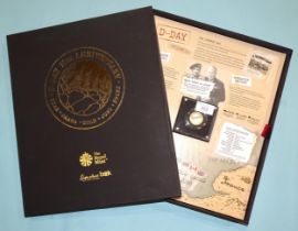 A Royal Mint Limited-edition D-Day 75th Anniversary Newspaper History Book and silver proof £2