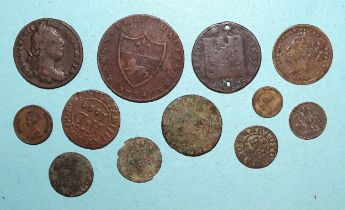 A collection of various 17th, 18th century and later tokens, including a 1669 Dorchester farthing