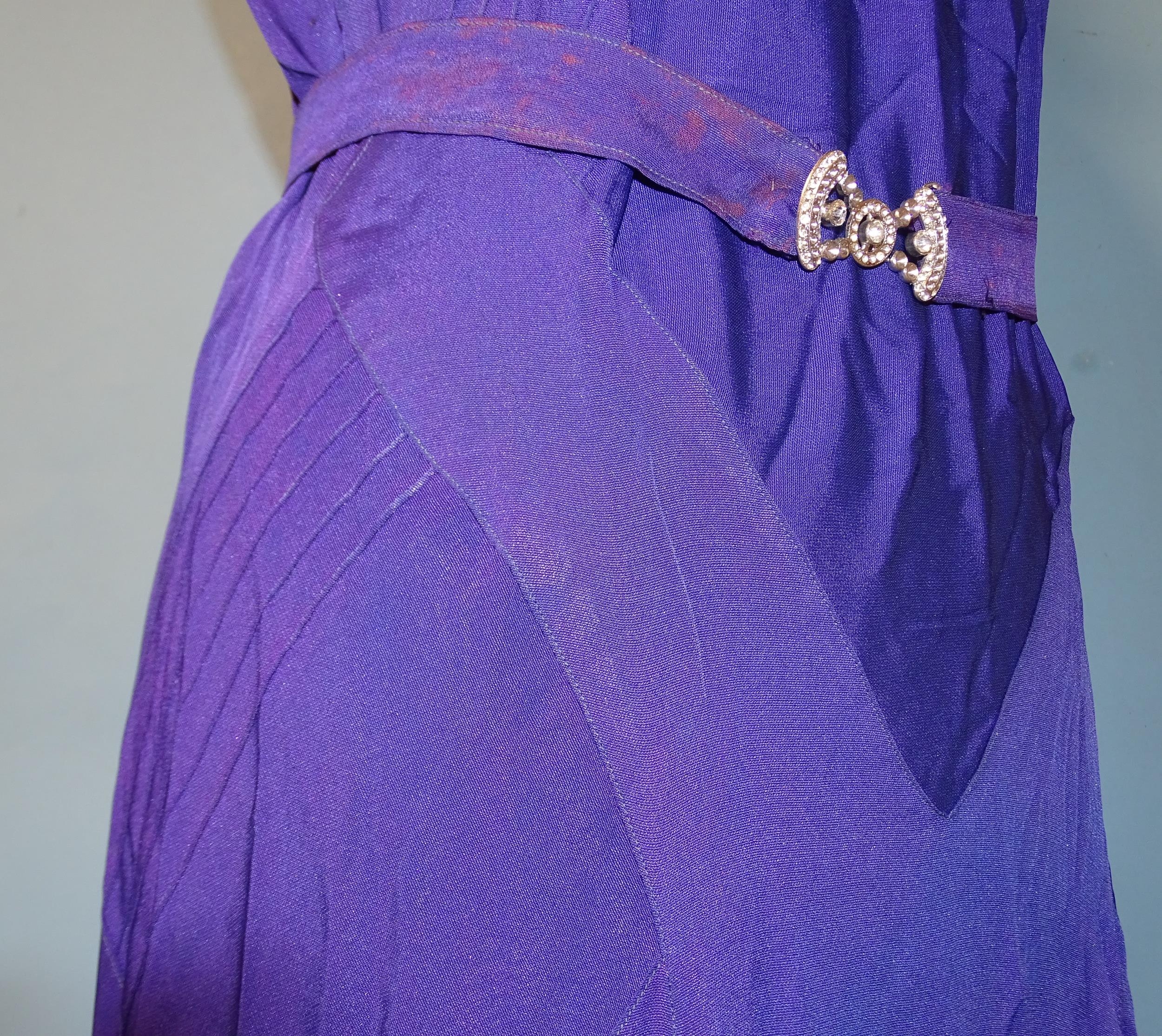 A 1930's evening dress of purple satin-like material, sleeveless, with hand-beading to neckline, the - Image 3 of 5