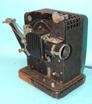 A Eumig ciné film projector with Hugo Meyer Gorlitz Kinon Superior I f:3.5cm lens and seventeen