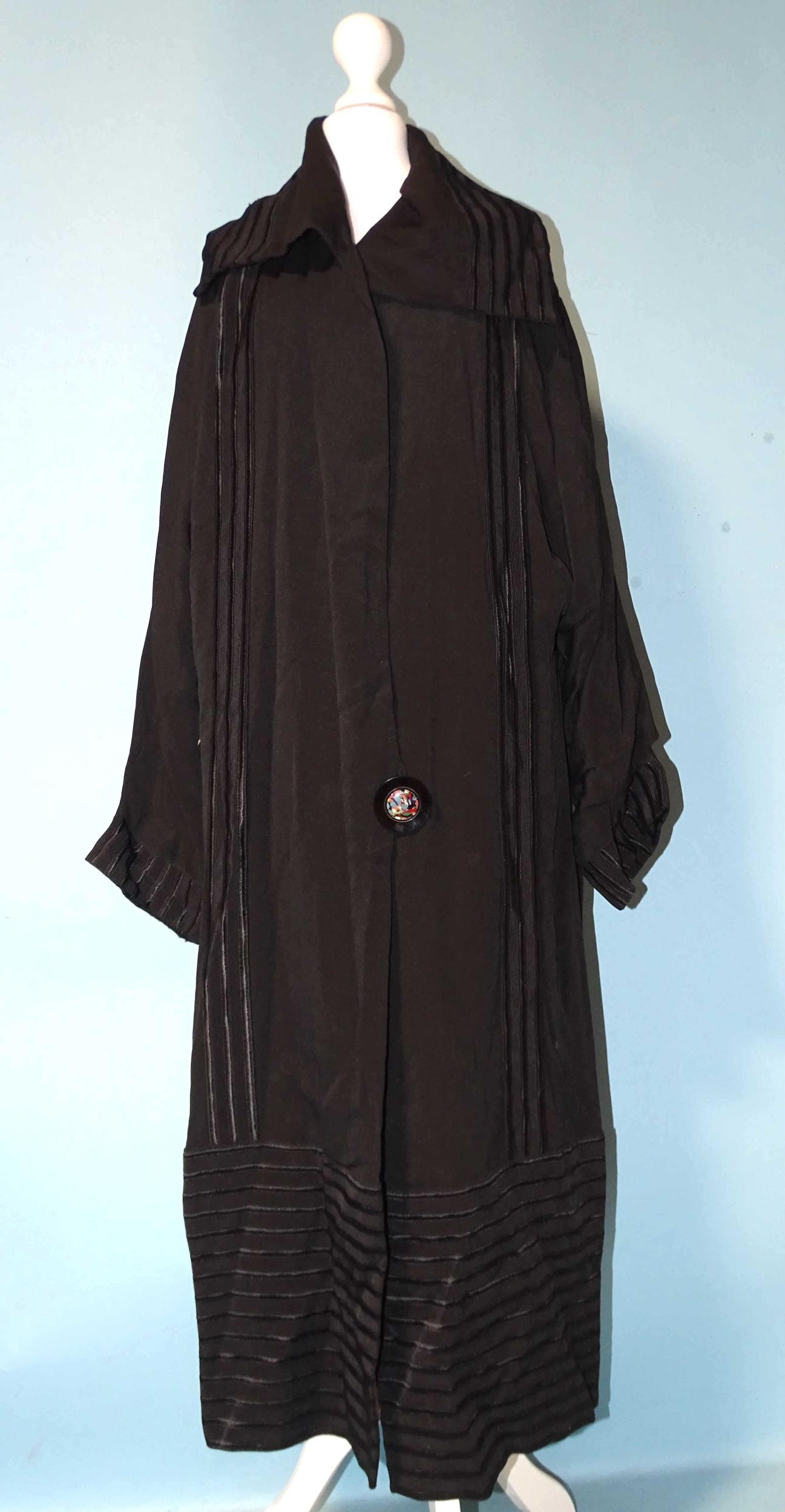 A faux Astrakhan coat, an early-20th century black crepe coat, a later leather/sheepskin - Image 2 of 4