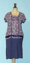 A 1920's silk day dress, a satin shift dress, a collection of blouses and other items.