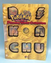 Pokémon TCG - Pikachu World Collection set of nine cards, set is open in folder and approximately