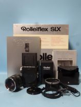 A Rollei SLX camera, serial no.602250084, with Rollei HFT Planar f2.8 80mm lens, film holder, lens