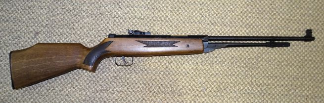 An unmarked .22 underlever air rifle.