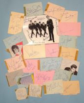 A collection of 1960's pop star and groups autographs on detached programme and loose autograph