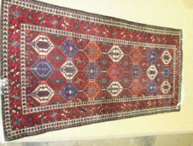 A modern Oriental wool rug, 153 x 320cm.