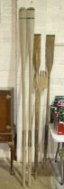 Two sets of wooden oars, 257cm and 218cm long.