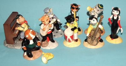 A Beswick nine-piece cat band: 'Purrfect Pitch' CC1, 'Calypso Kitten' CC2, 'One Cool Cat' CC3, '