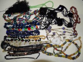 A quantity of bead jewellery.
