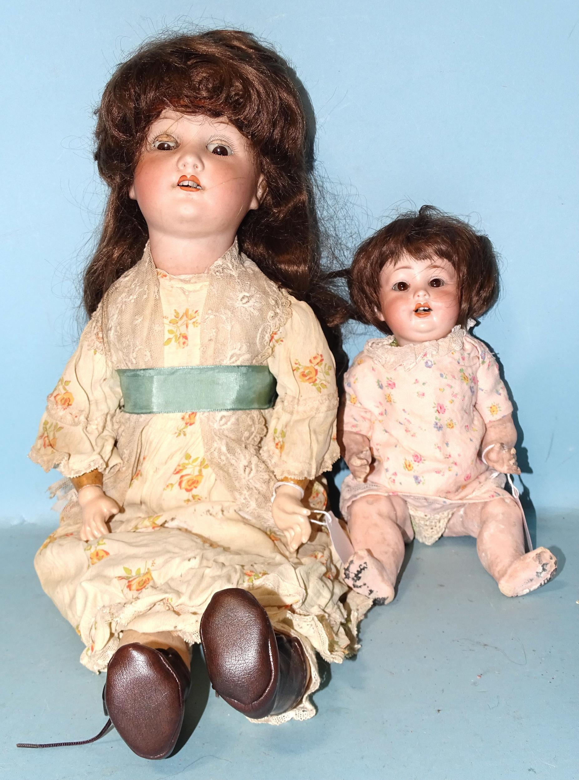 A Porzellanfabrik Mengersgereuth bisque head doll, marked PM 914 Germany 1, with sleeping brown