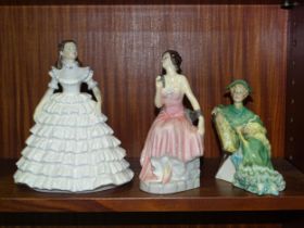 A Royal Doulton figurine 'Ascot' HN2356, a Coalport figurine 'Melanie' and one other '